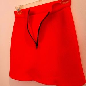 Topshop mini skirt neon orange size: US 2. Good condition